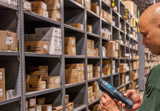 warehouse worker with Zebra mobile computer