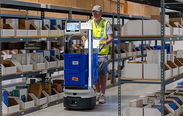 Warehouse worker using AMR